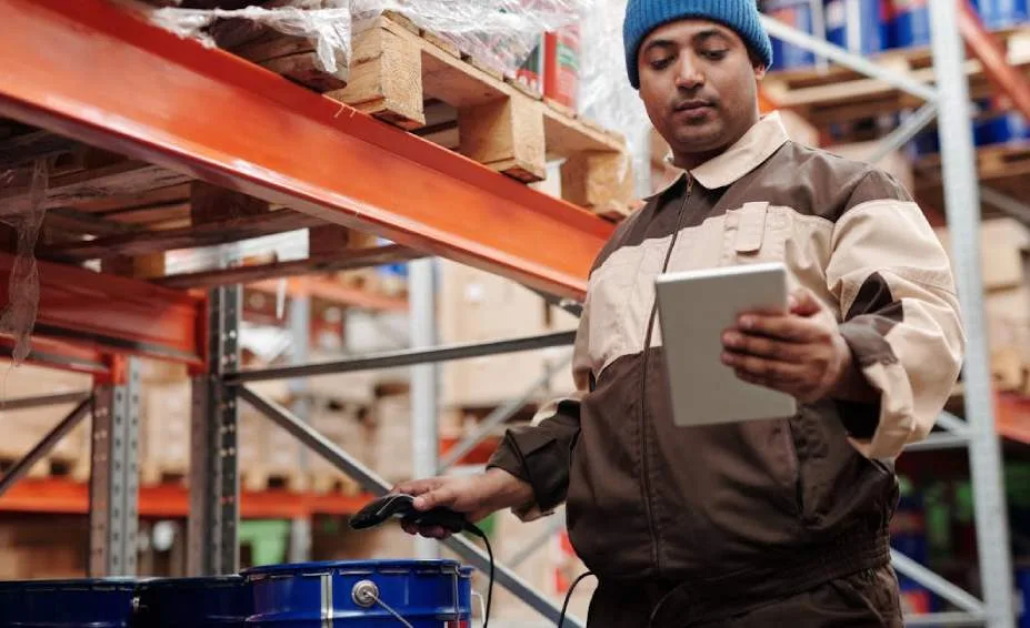 person scanning in a warehouse